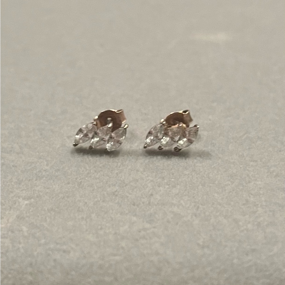 Francesca’s 14k rose gold triple diamond studs